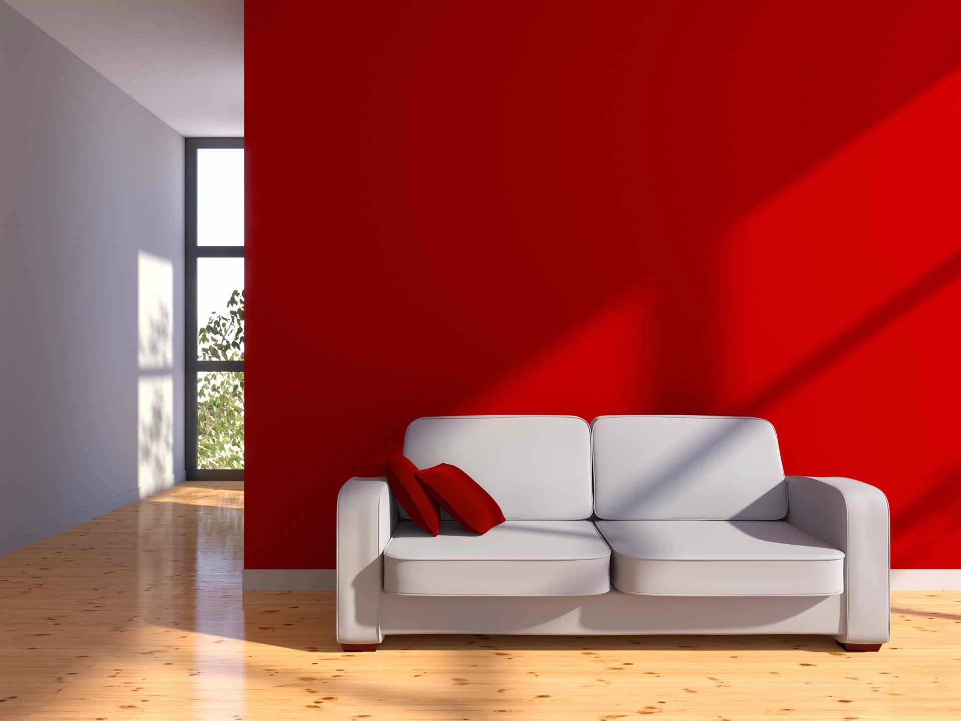Intérieurs de salon minimalistes avec canapés rouges à Athis-Mons